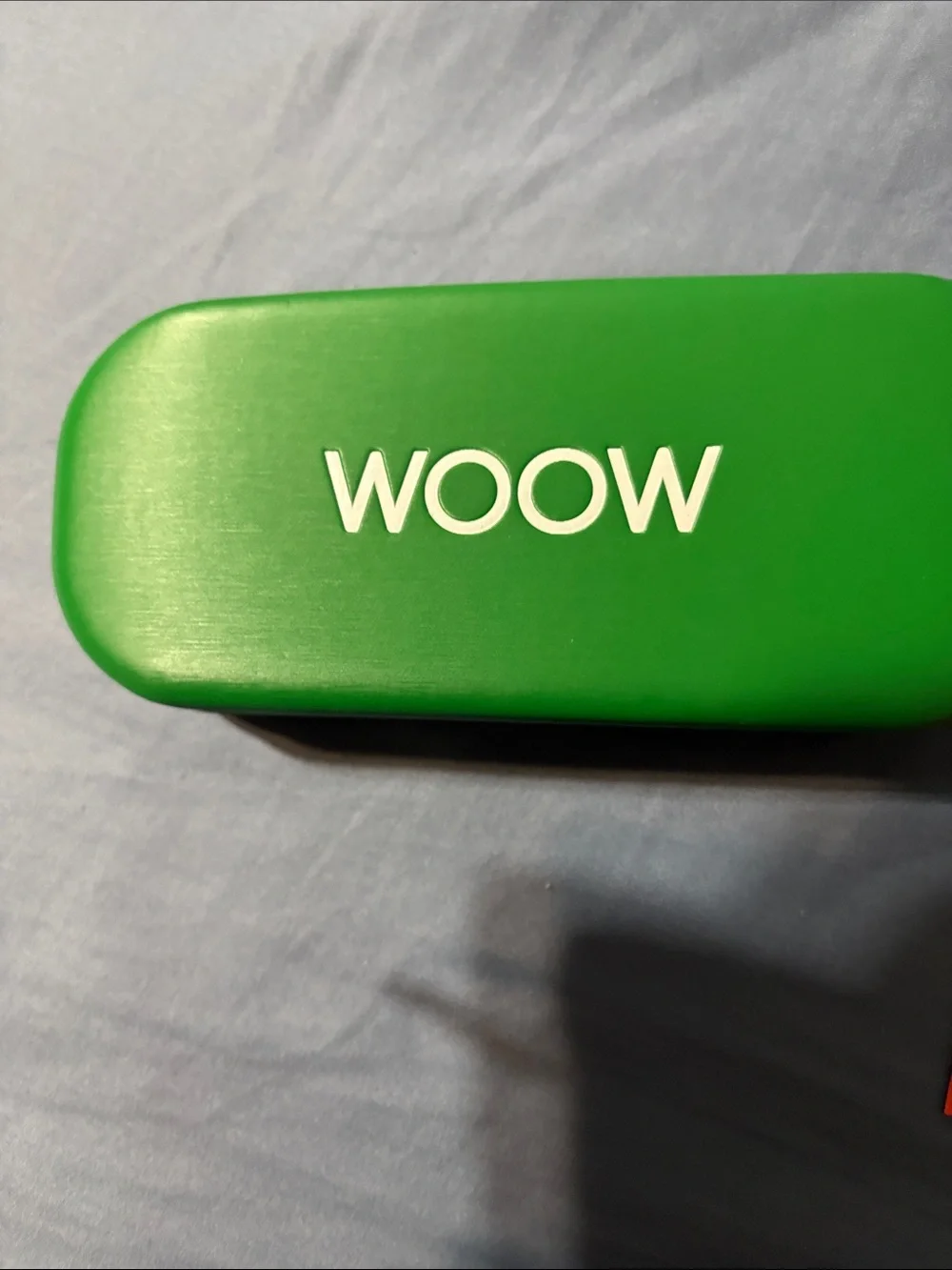 Green Eyeglass Case with Orange Cleaning Cloth
